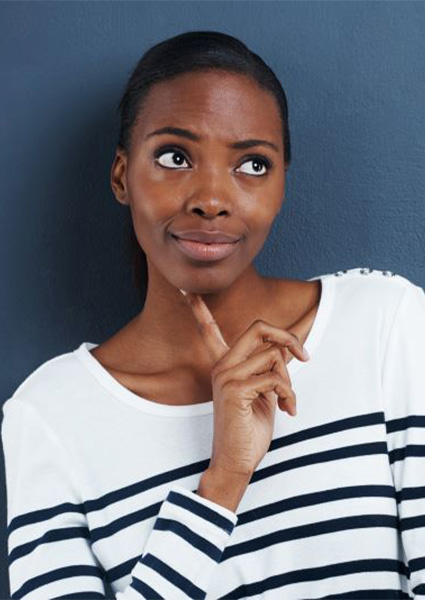 Woman wearing thoughtful, curious expression on her face